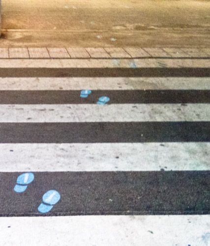 Arriva stickers on the floor outside Amsterdam Centraal Station